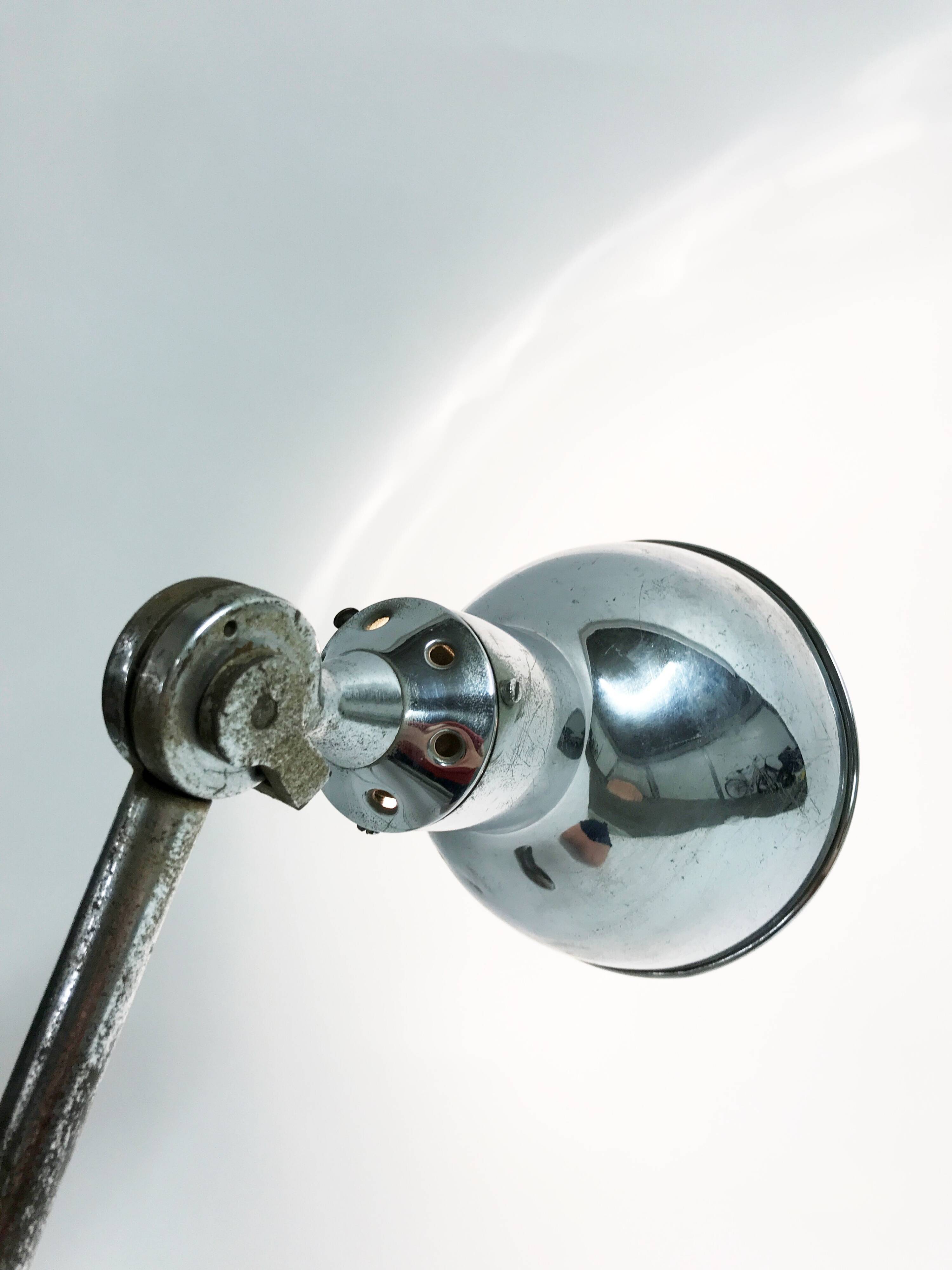 Vintage industrial chrome work light by AGI, 1930s