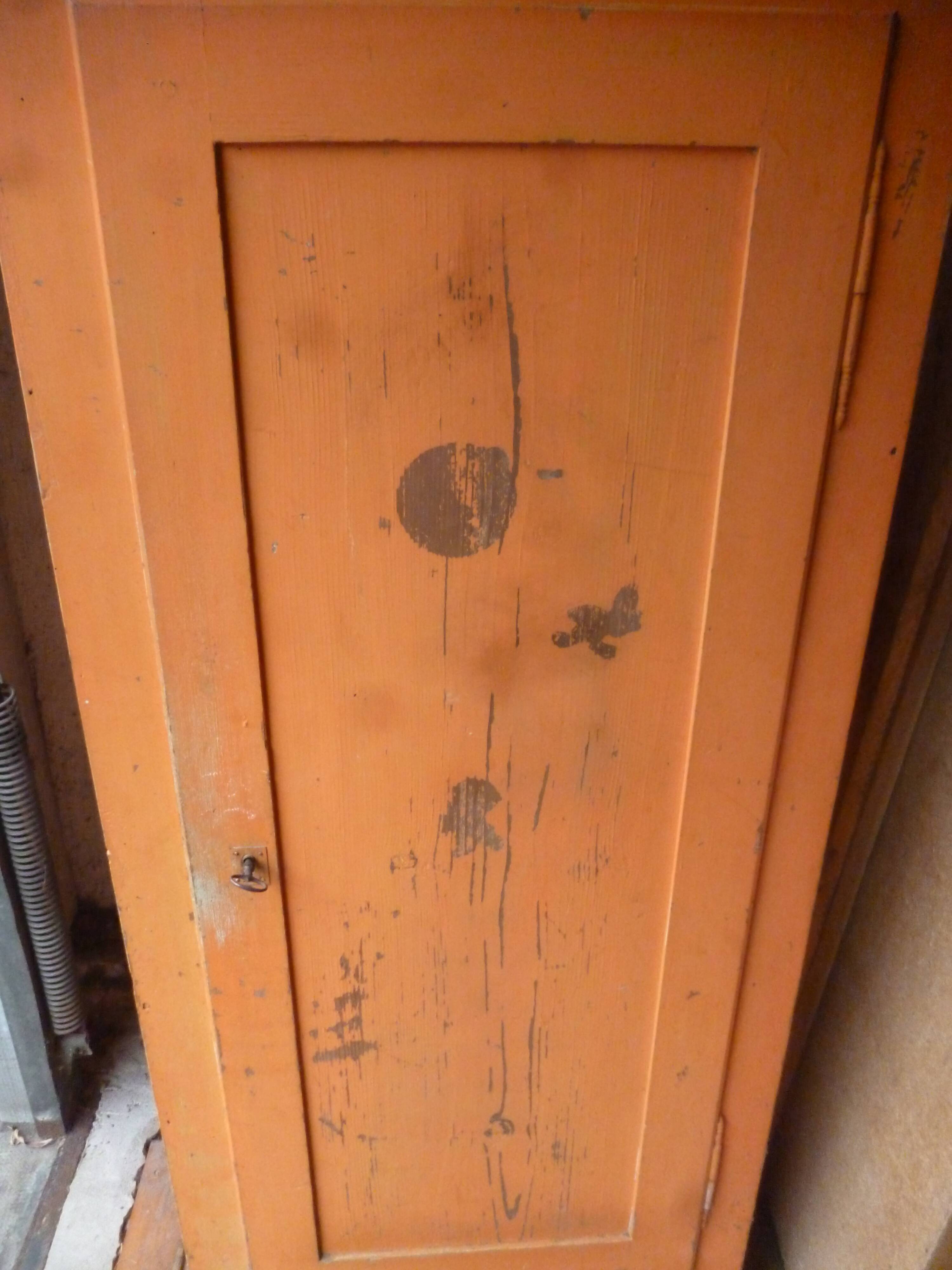 Small piece of furniture with orange patina