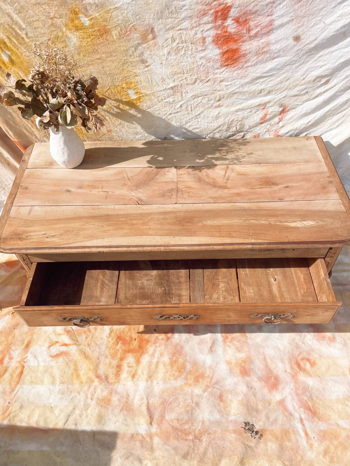 Vintage and rustic TV stand or coffee table in carved raw wood