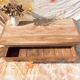 Vintage and rustic TV stand or coffee table in carved raw wood