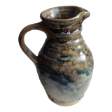 Enamelled ceramic pitcher, signature mb the terminal