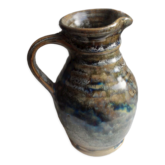 Enamelled ceramic pitcher, signature mb the terminal