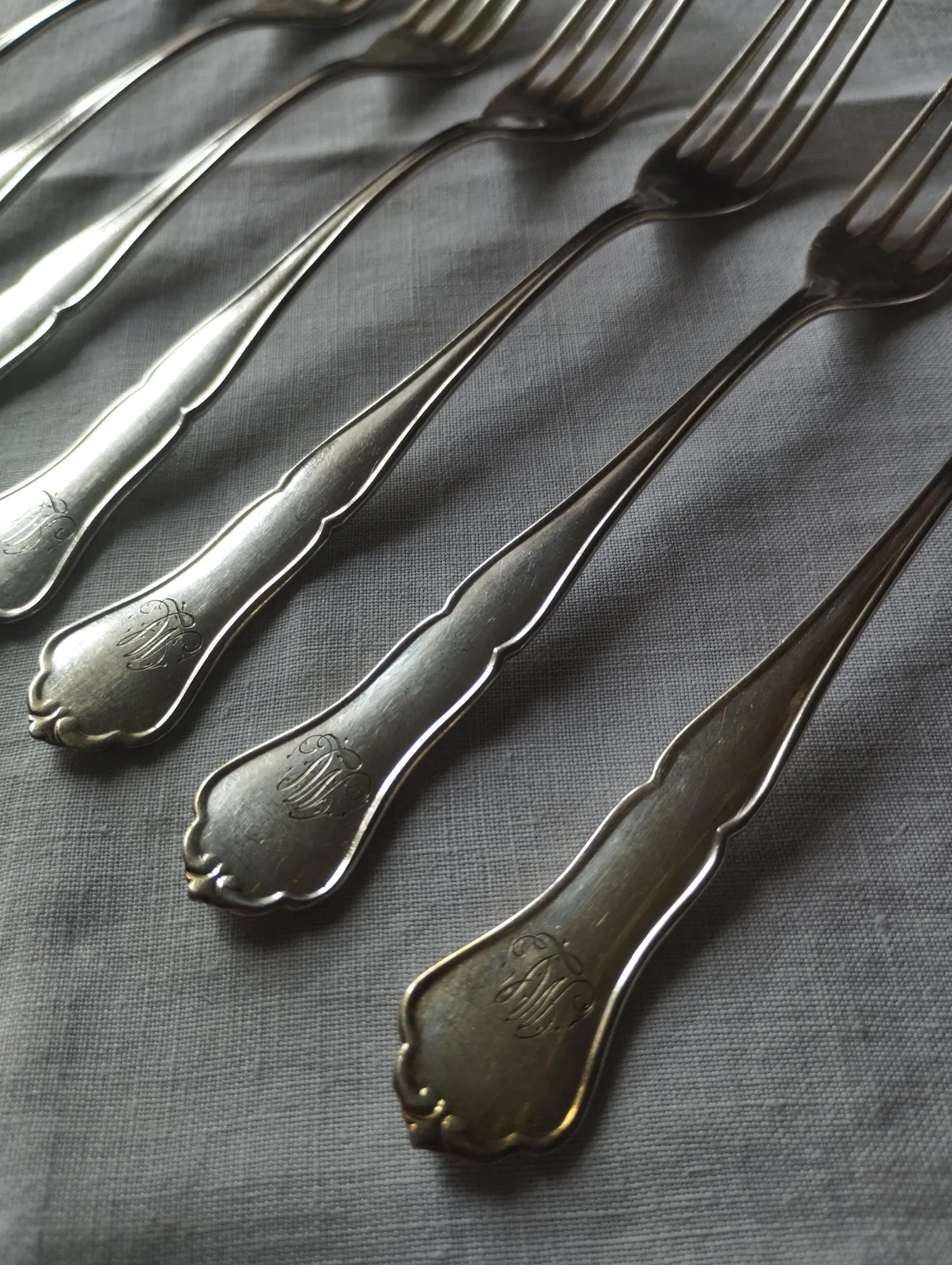 8 small numbered silver-plated forks Sorsakoski