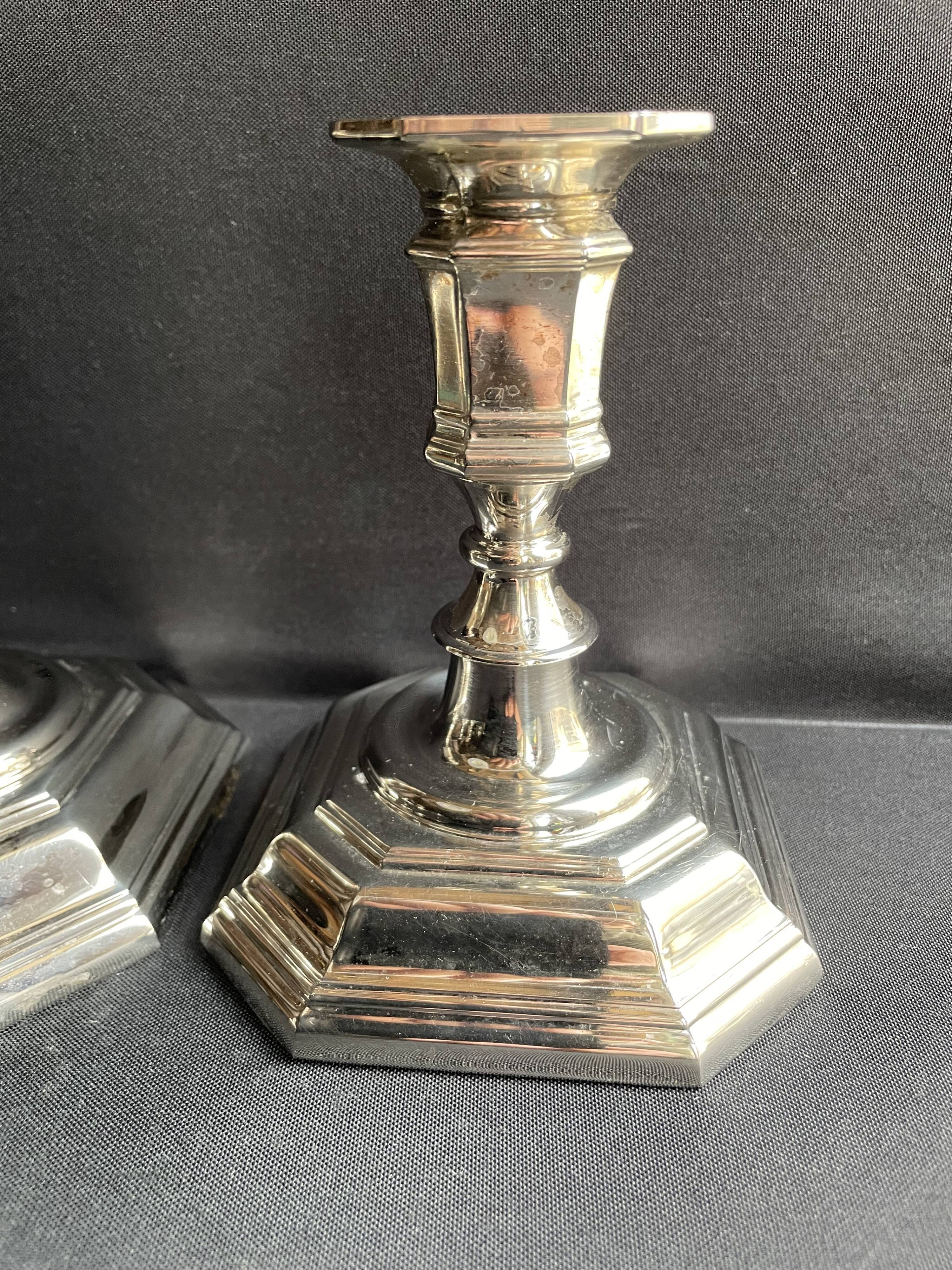 Pair of candlesticks in silver metal regency style