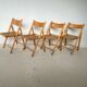 Set of 4 folding chairs, vintage design, wooden structure and canned seat. Around 1970