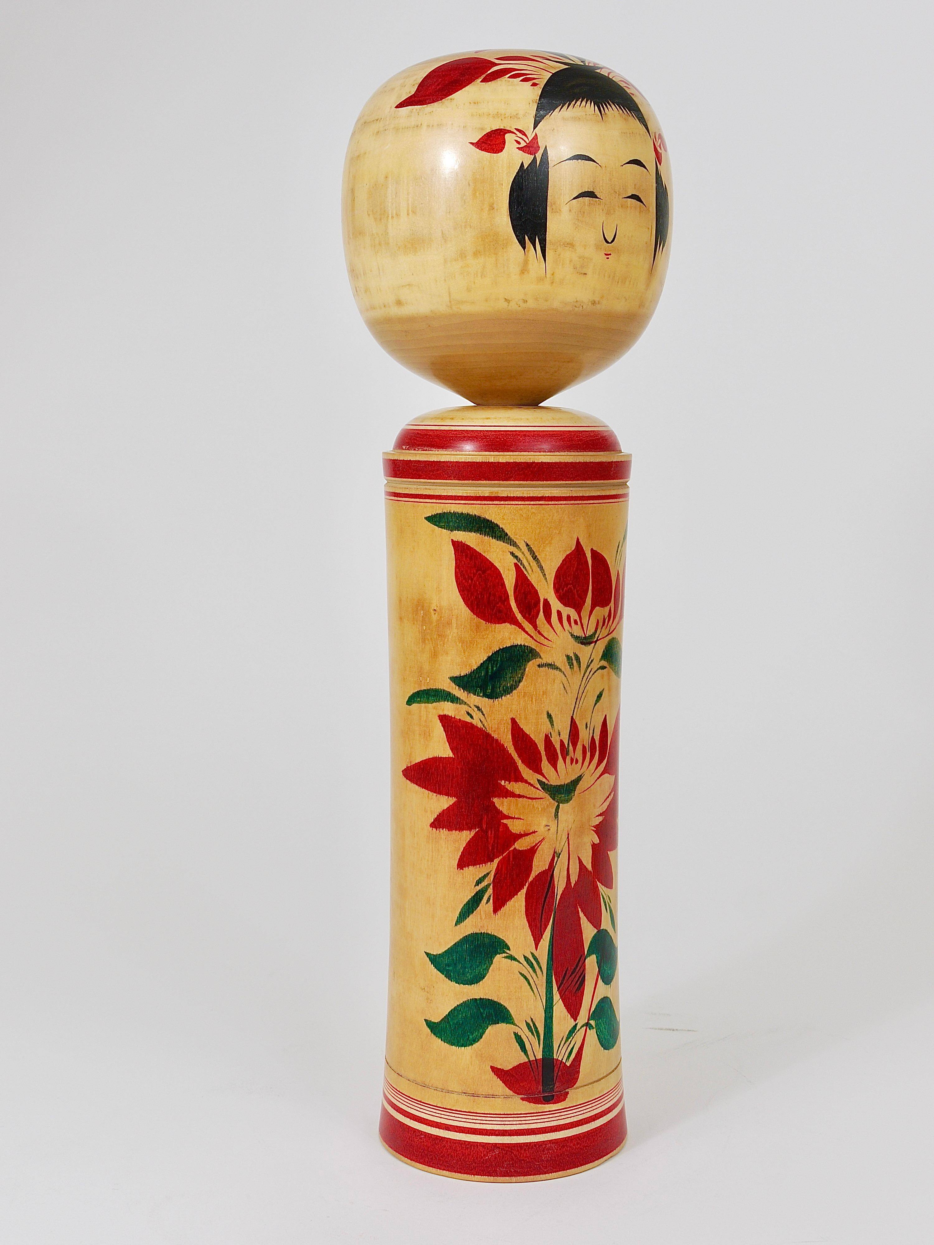 Decorative Naruko Kokeshi doll sculpture from northern Japan, hand-painted.