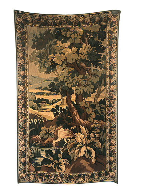 Tapestry decorated with a pink flamingo in a green landscape, woven by hand