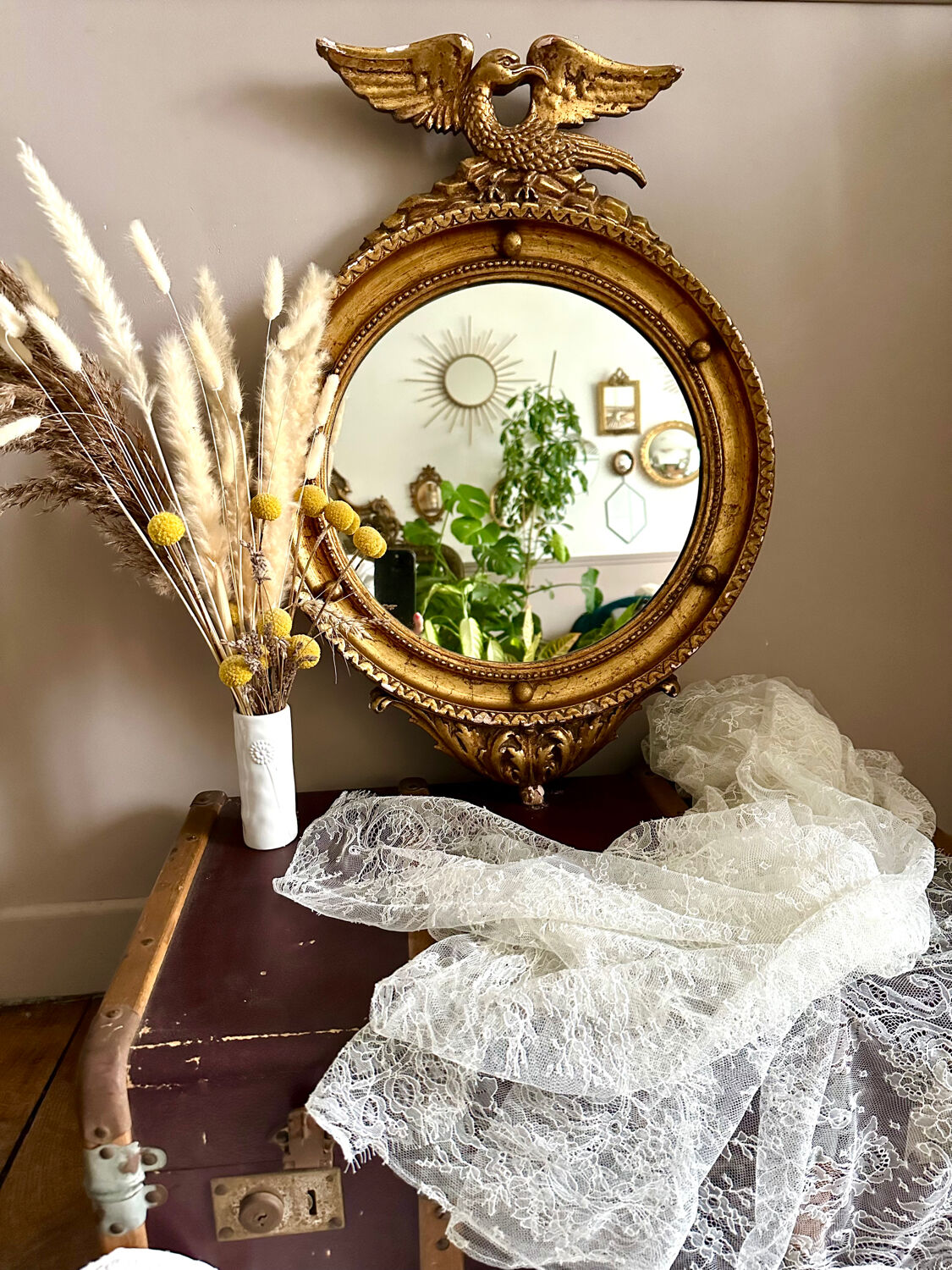 Antique gilded mirror decorated with an eagle