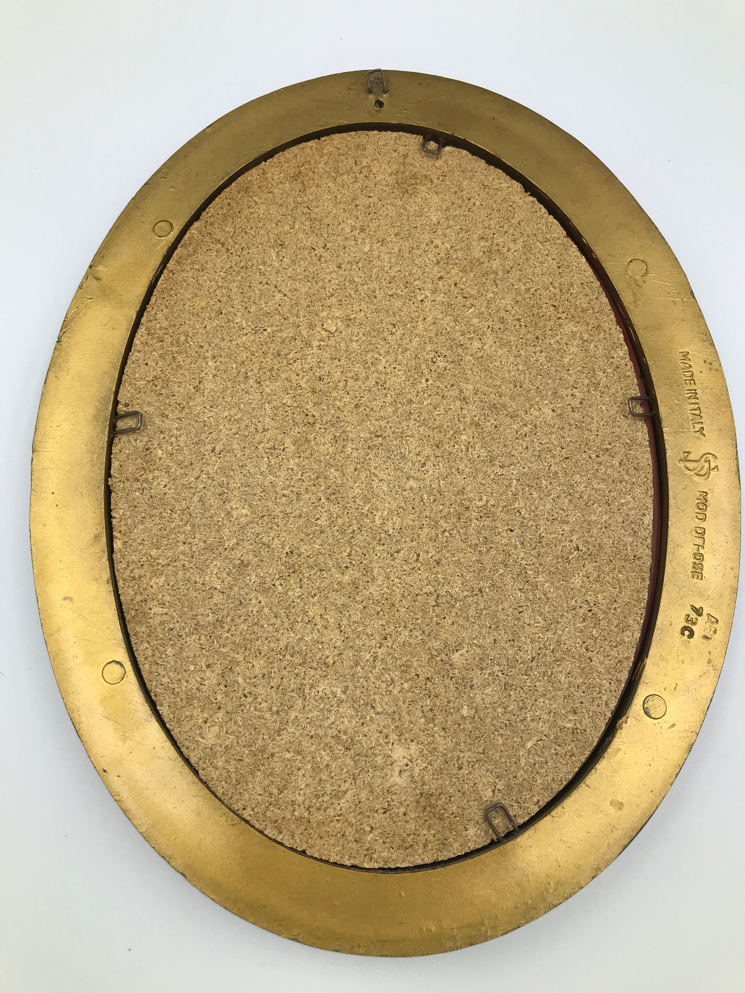 Vintage old bevelled oval mirror