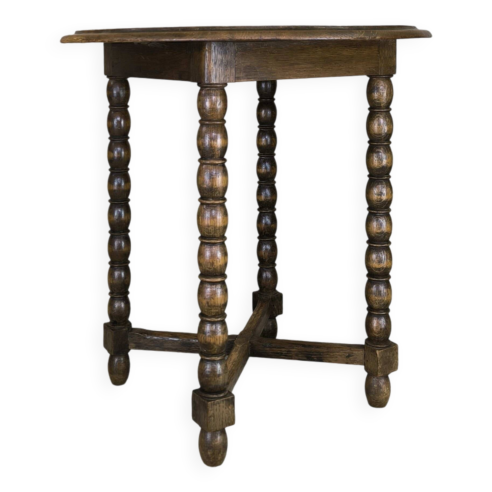 Vintage gueridon with beaded wooden legs.