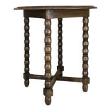 Vintage gueridon with beaded wooden legs.