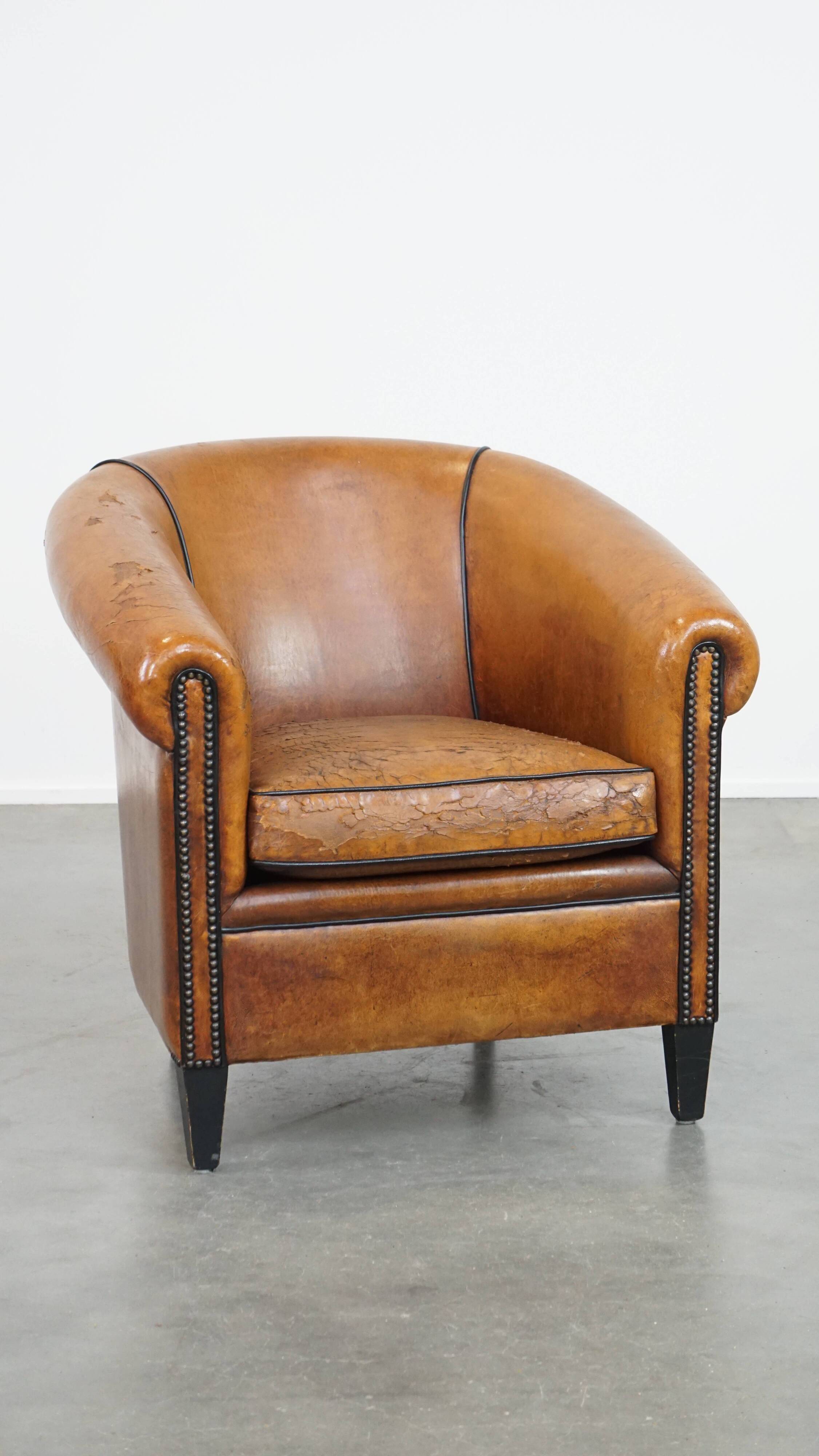 Sheep leather club chair with patina