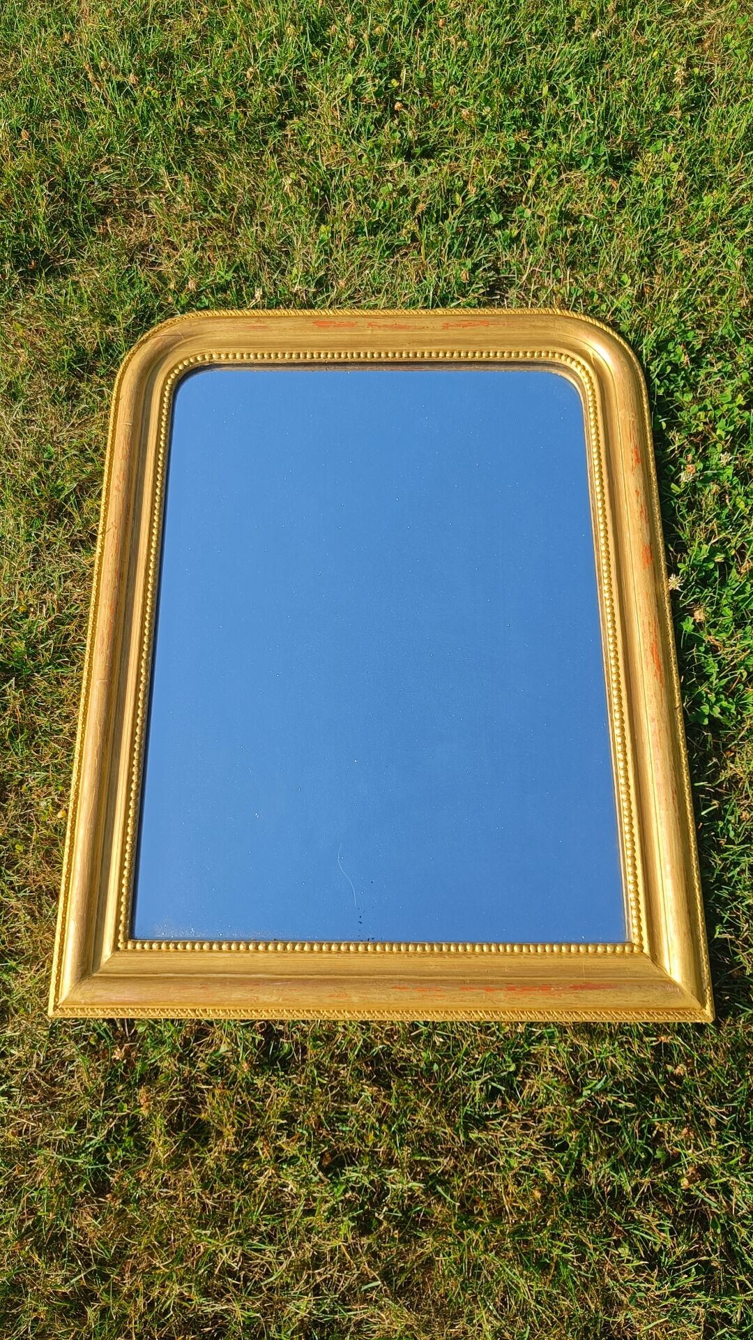Antique gilded patinated Louis-Philippe mirror