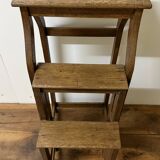 Stool transforming into a step ladder.