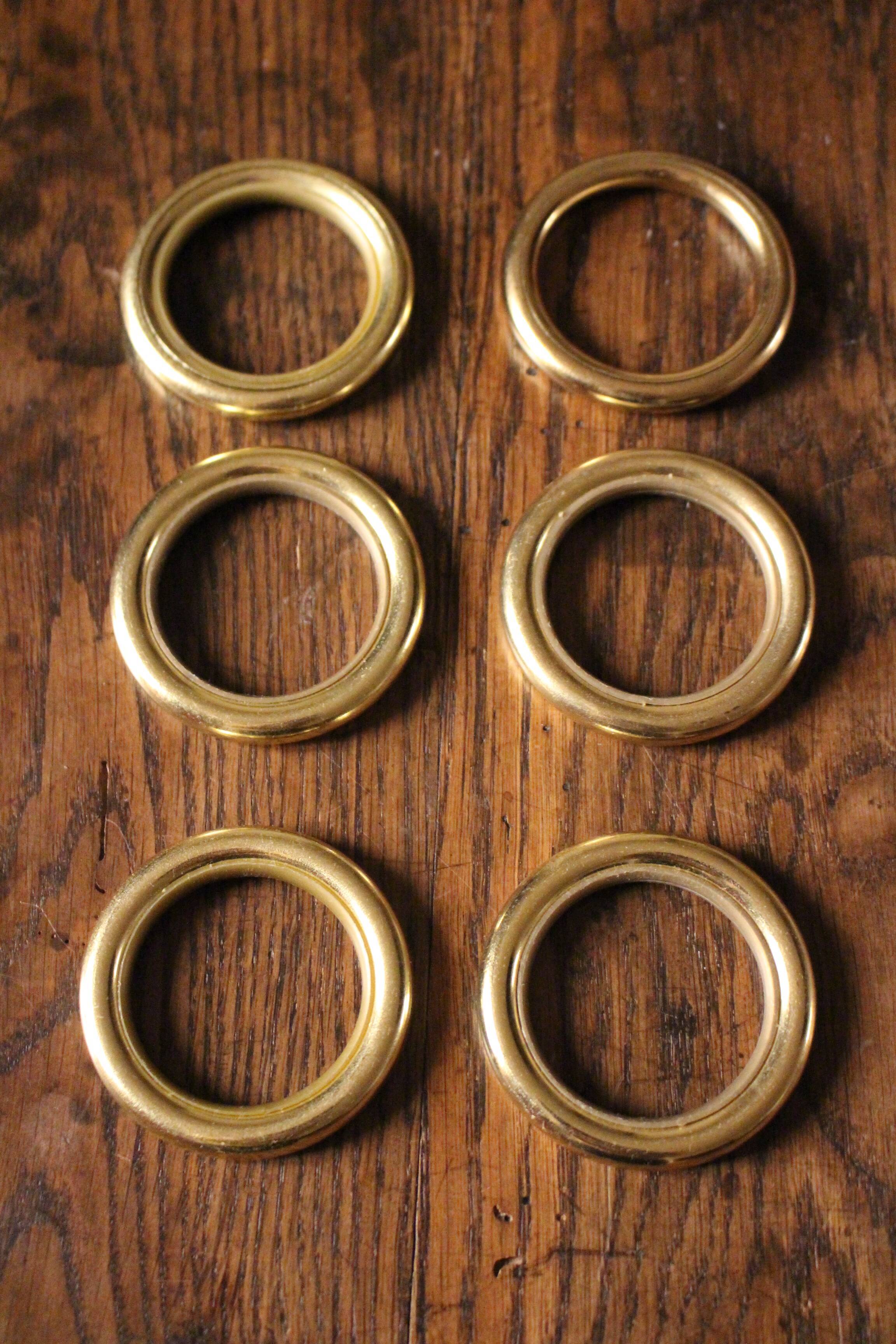 Lot 6 Golden metal towel rings