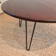 Round coffee table with mahogany wood top
