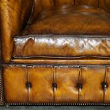Vintage Chesterfield leather sofa bed, fully restored, circa 1940.