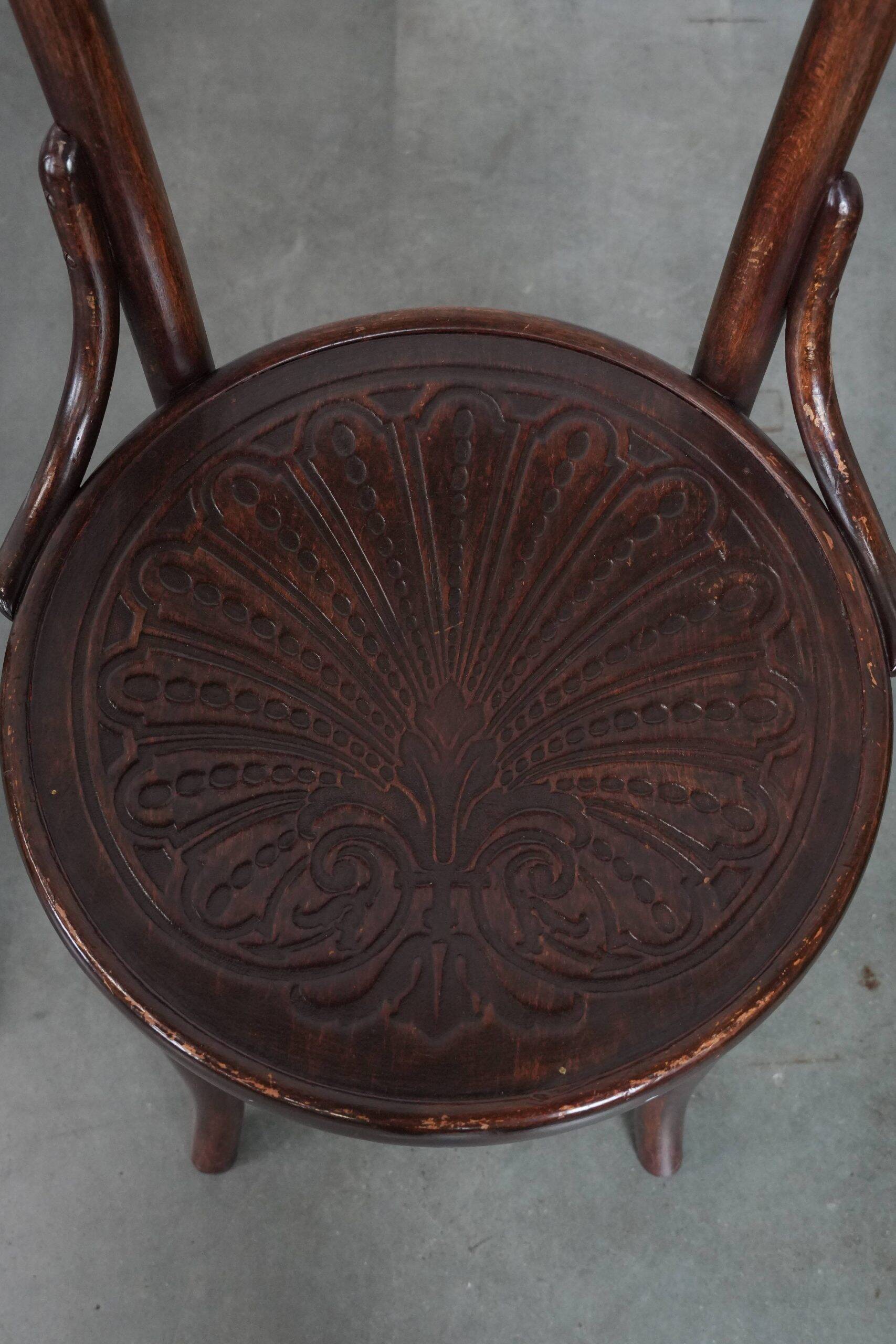 Set of five vintage wooden Cosmos bistro design chairs with stunning detail