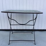 Folding riveted iron table