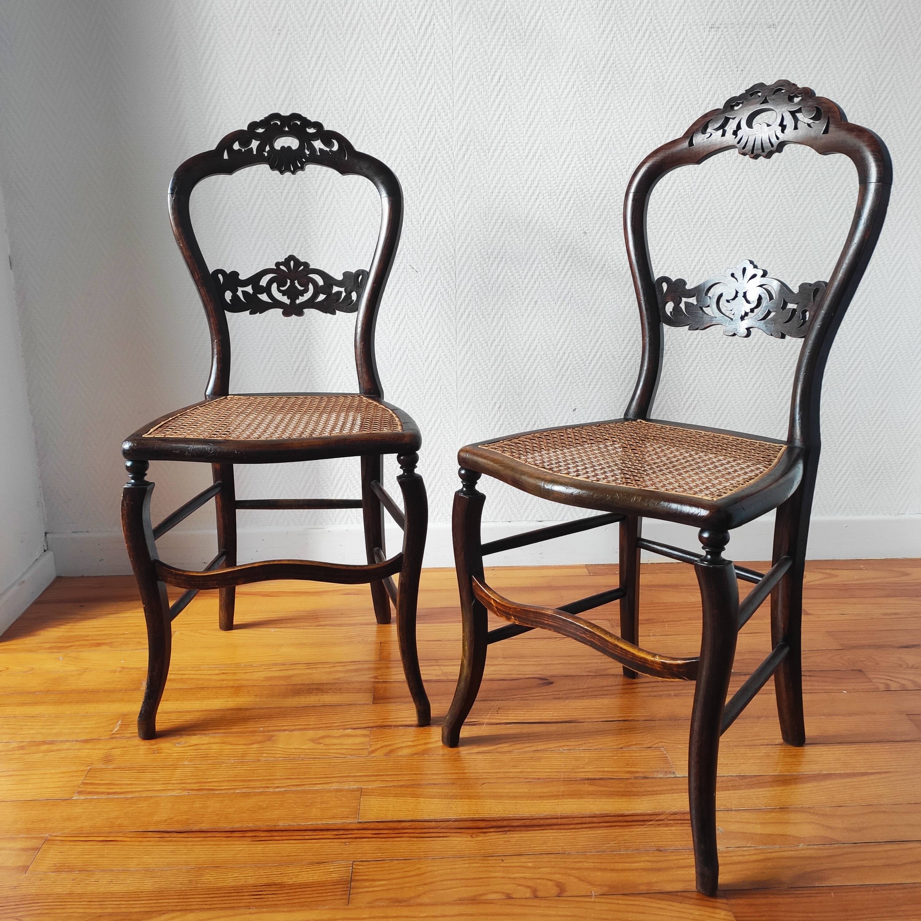 Pair of chairs from the early 20th century, Napoleon III style, with caned seats.
