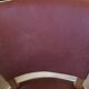 Skai chair binds wine and wooden footpieces and armrests