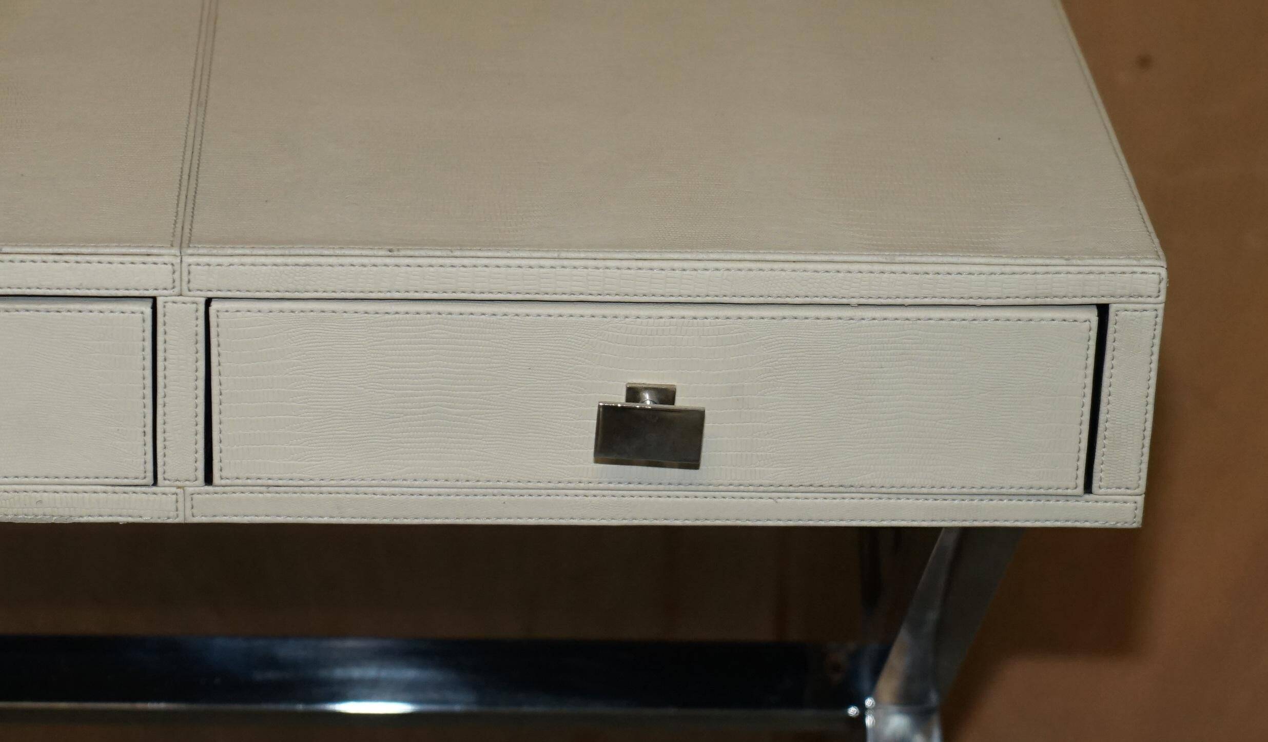 Vintage writing desk with chrome X-shaped top and patinated crocodile leather.