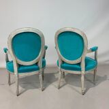 Pair of Louis XVI convertible armchairs