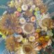 Domed glass frame with its bouquet of dried flowers