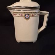 Vintage vase, geometric frieze and flowers with a black border.