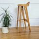 Elegant and tall wooden stool by Baumann