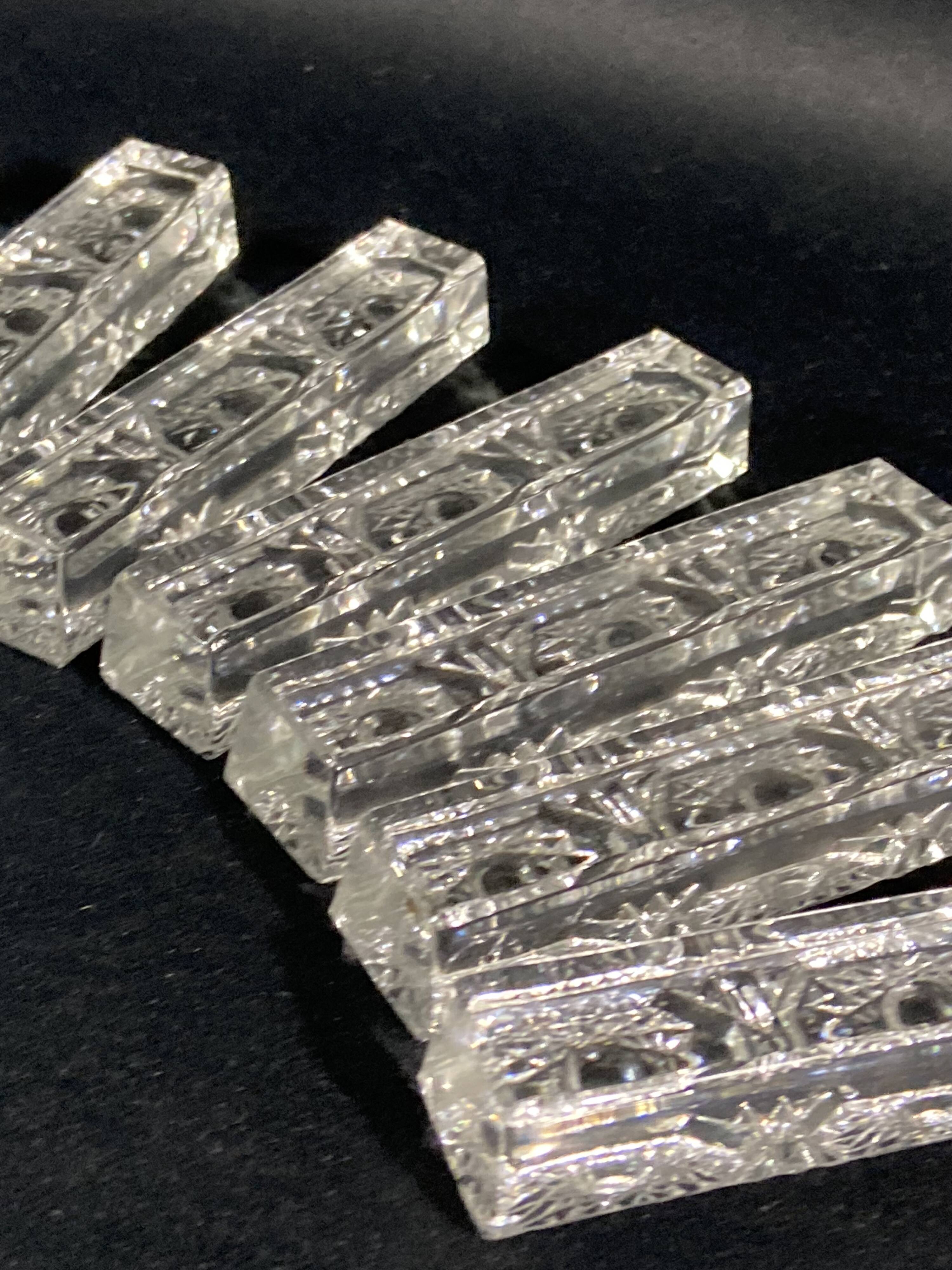 Set of 12 molded glass or crystal knife rests with diamond point decor