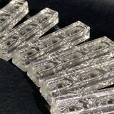 Set of 12 molded glass or crystal knife rests with diamond point decor