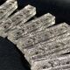 Set of 12 molded glass or crystal knife rests with diamond point decor