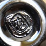 Black vase stamped MV