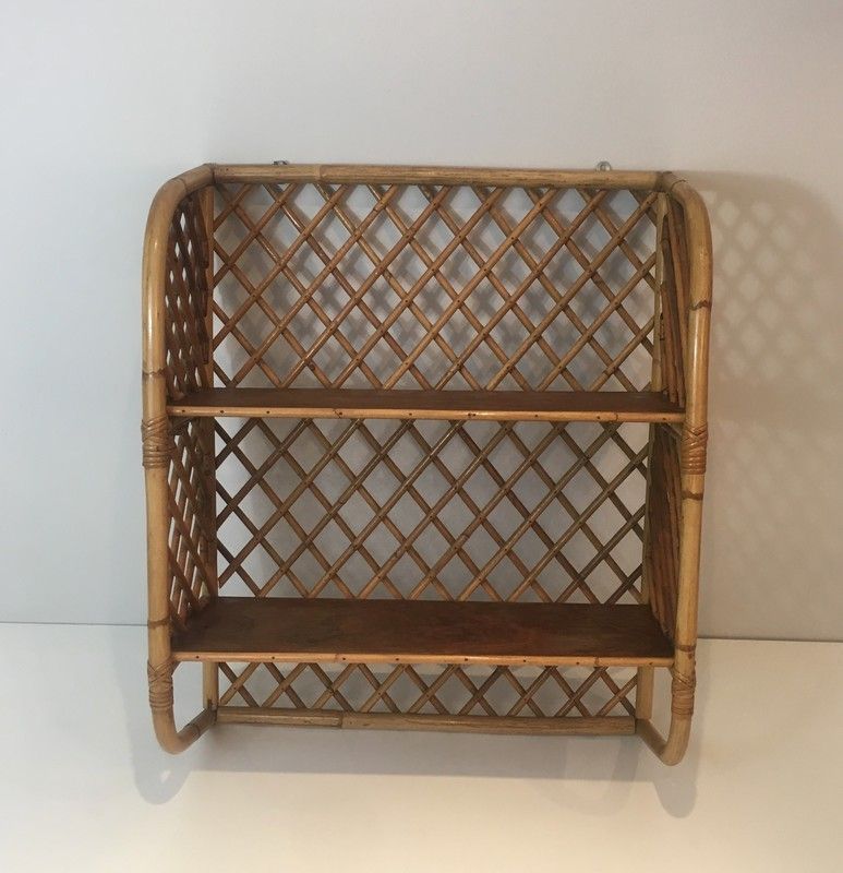 Rattan wall shelf. Attributed to Audoux-Minet