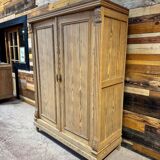 Small antique wardrobe in solid pitch pine.