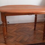 Round table with folding sides