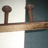 Wooden wall-mounted coat rack