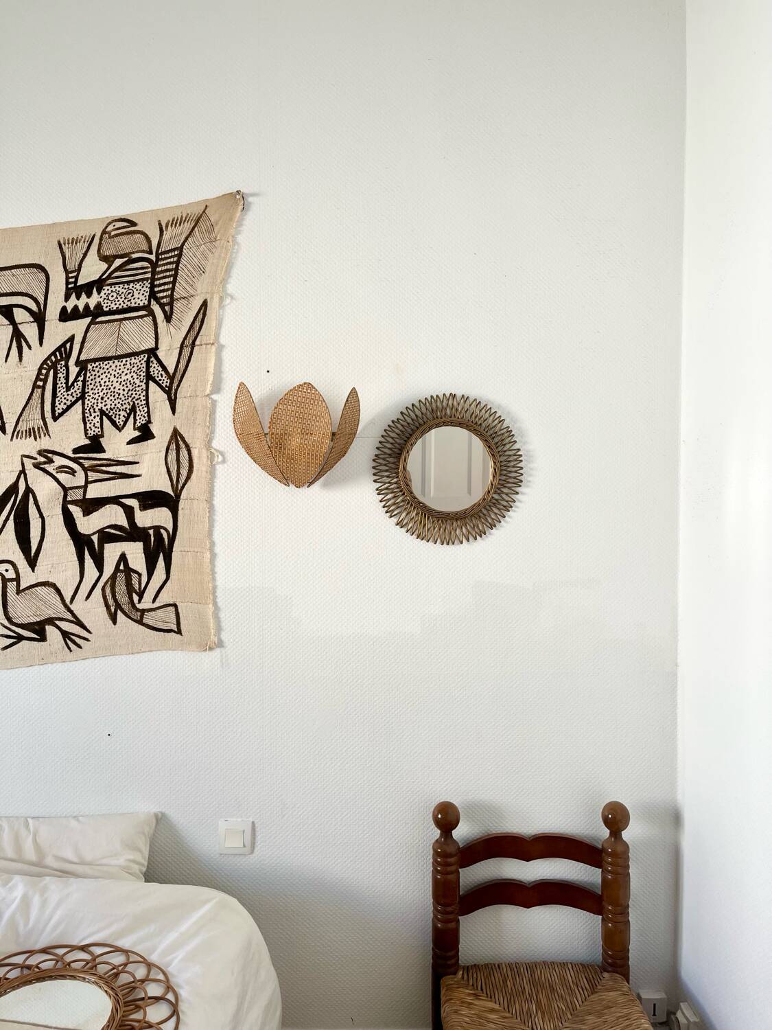 Vintage gold rattan sun mirror