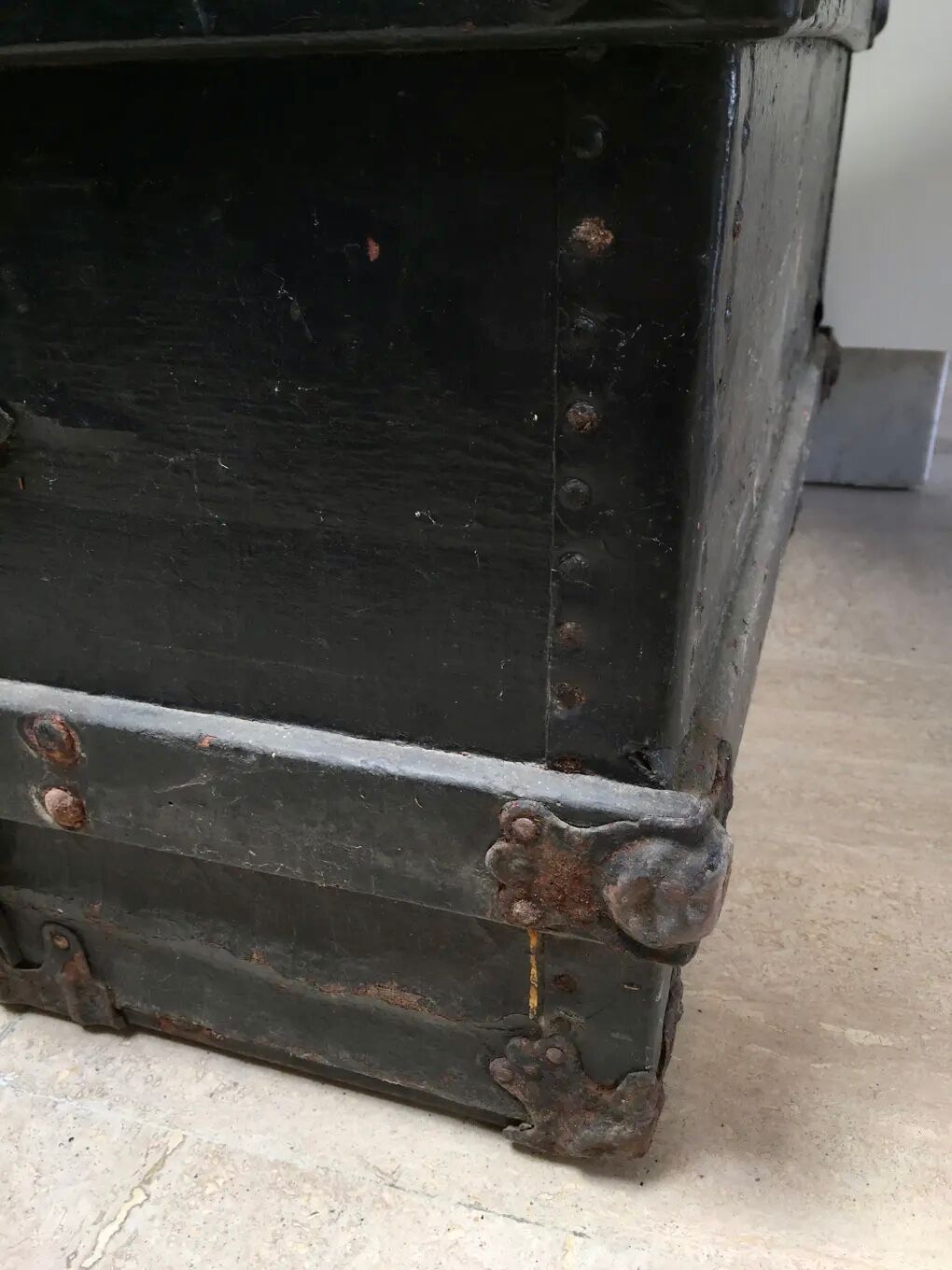 Black ancient travel trunk, 19th