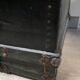 Black ancient travel trunk, 19th