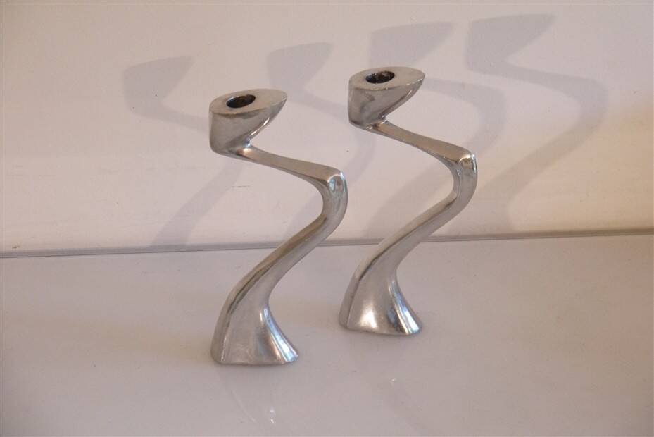 Pair of aluminium cast candle holders