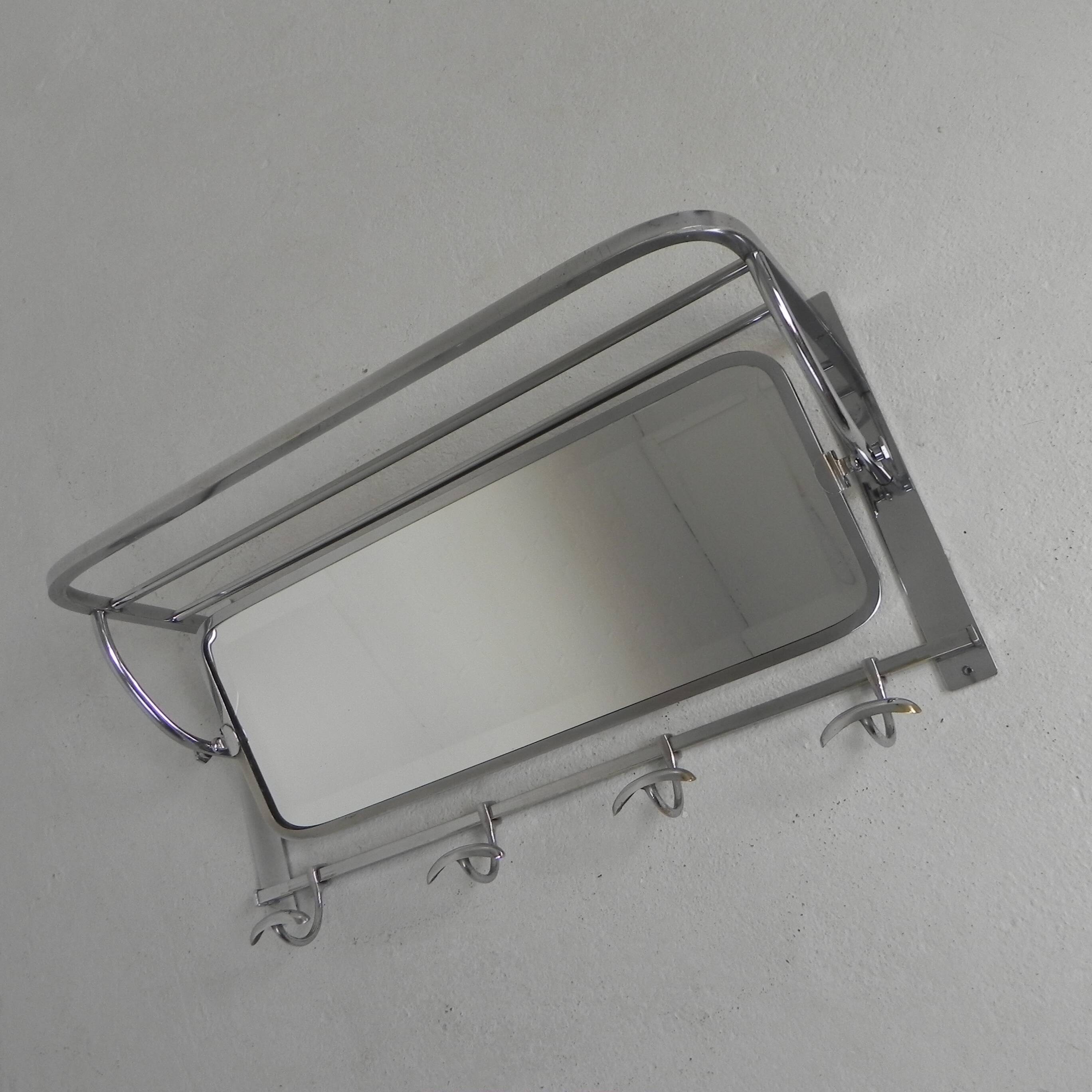 Art Deco wall coat rack with a bevelled mirror adjustable in a chrome frame, 1930s.