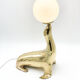 Vintage brass sea lion lamp