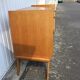 Commode vintage au pied compas