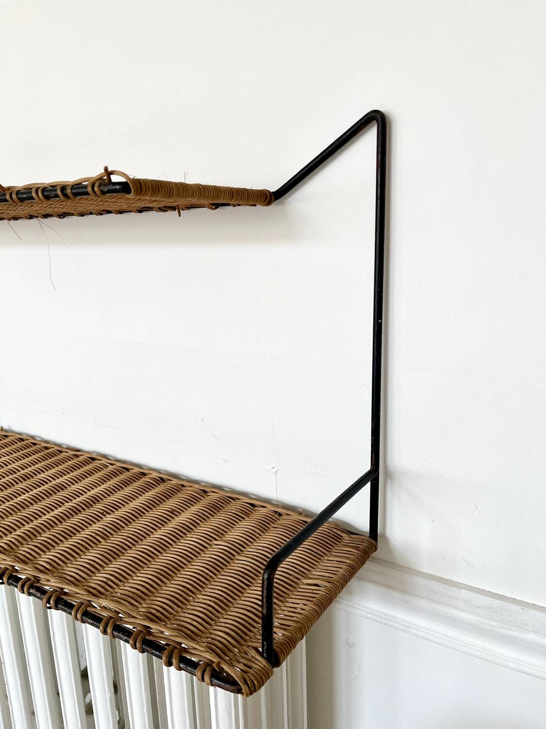 Raoul Guys rattan wall shelf 1950