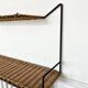Raoul Guys rattan wall shelf 1950