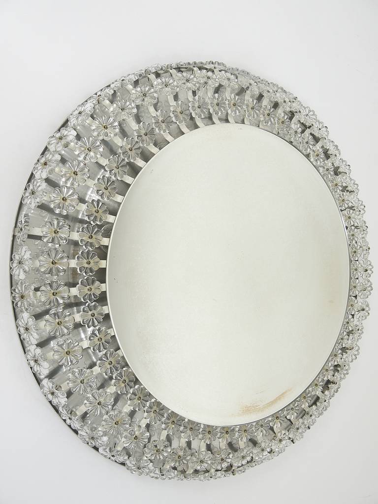 Large round wall mirror with glass flowers by Emil Stejnar, backlit by Nikoll, Austria.
