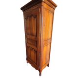 Solid oak bonnetière signed Jean Laïck