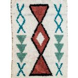 White Boucherouite Moroccan Berber rug with colorful patterns